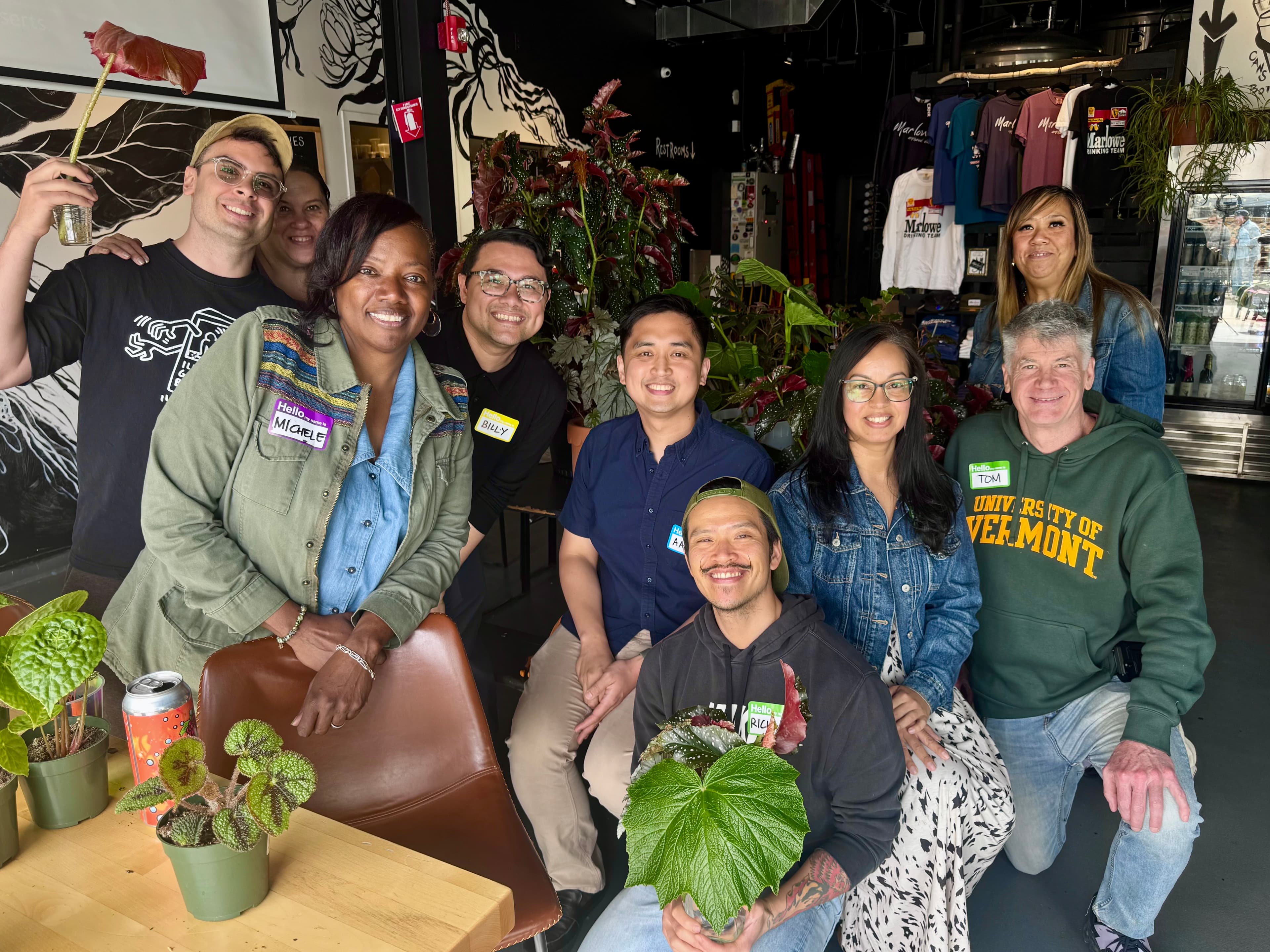 Hudson Valley Begonia Society members gathered around a meeting table